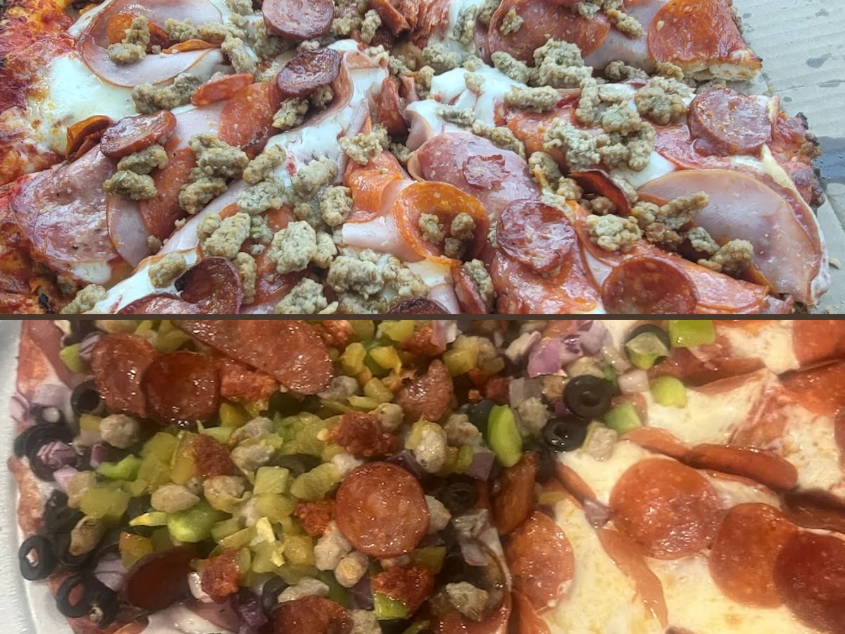 Casual pizza shop interior with arcade games nearby.