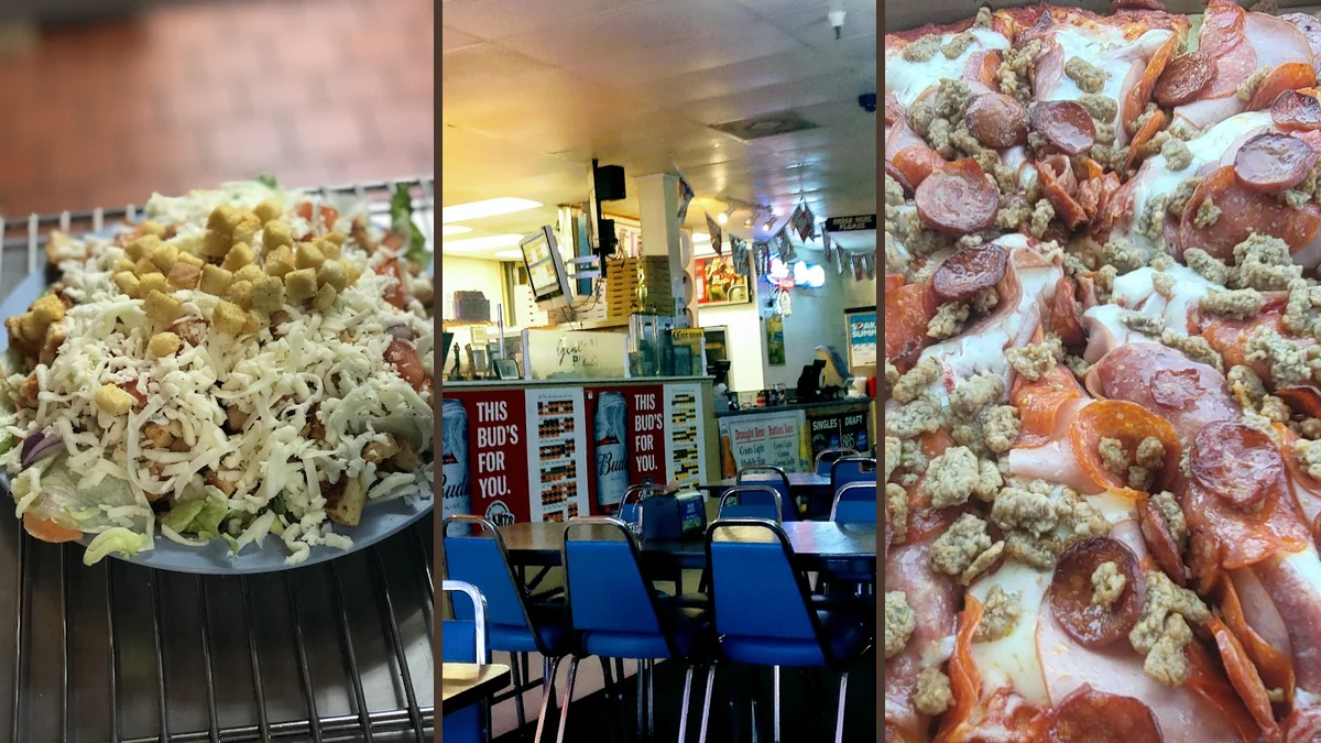 Pizza restaurant dining area with simple tables.