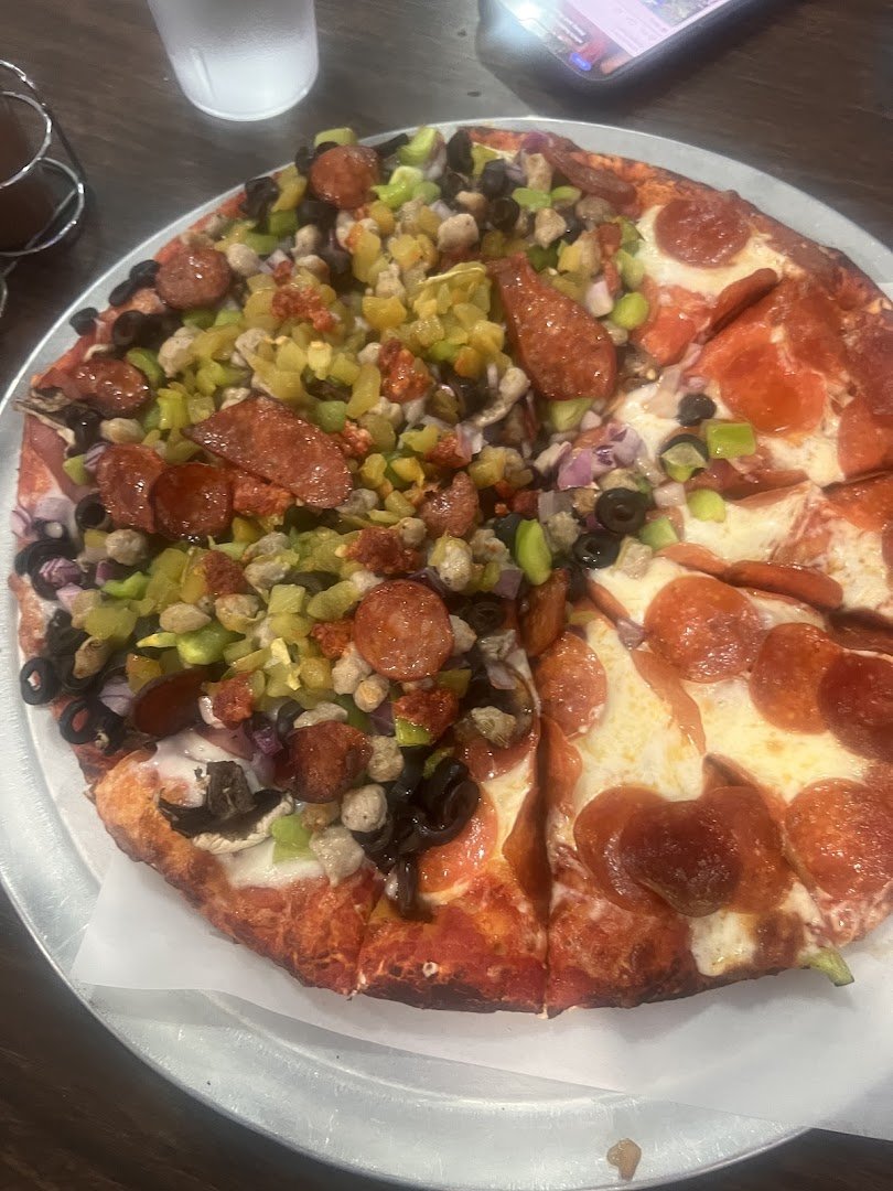 Family-friendly pizzeria with game machines.