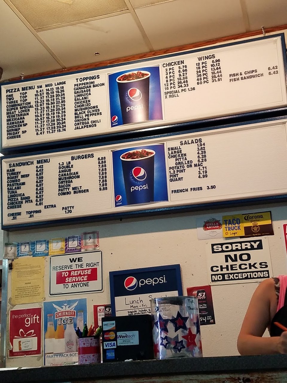 Pizza menu with specialty pies listed.