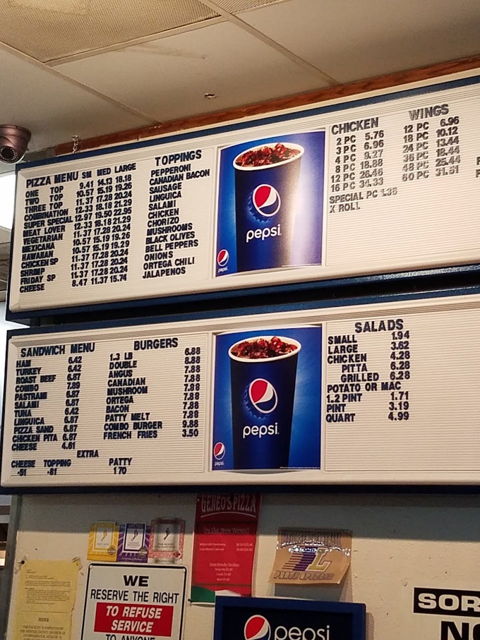 Printed menu for pizzas and comfort food.